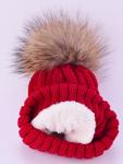 The hat with pom-pom