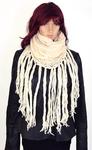 Knitted scarf with fringes