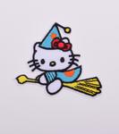 Iron-on patch kitten with broom