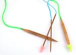 Knitting needle stoppers