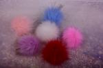 Fake 10 cm fur pom-poms with loop